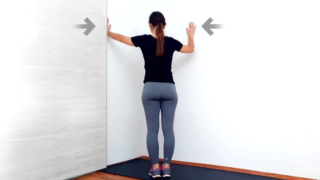 Razteg prsnega koša ob steni korak 2